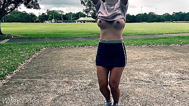 The wife dares to play basketball without bra and panties in a short skirt.