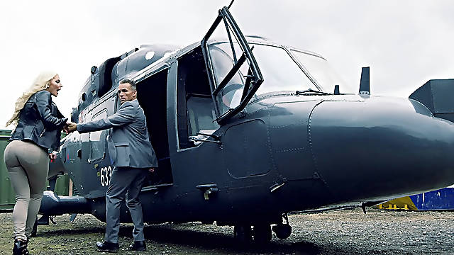 Big boobed blonde Nicolette Shea is having hardcore fuck in helicopter