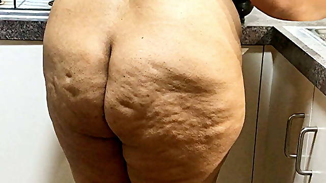 Beautiful Busty Wife cooking butt naked