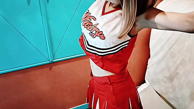 A cute busty married woman exercises 2 in a sexy cheerleader costume. Home made amateur Private Shoot